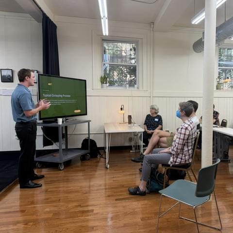 Aidan walking through the co-buying process slide